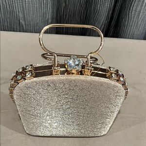 Glamorous Gold Tone Clutch with Large Rhinestone Accents